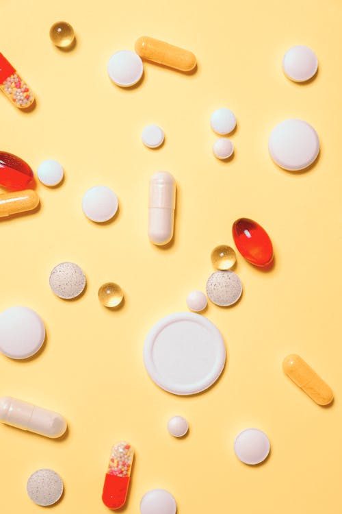 Free Red and White Medication Pills Stock Photo