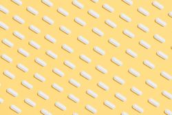 Pharmaceutical dilution calculator reference chart on pharmacy shelf