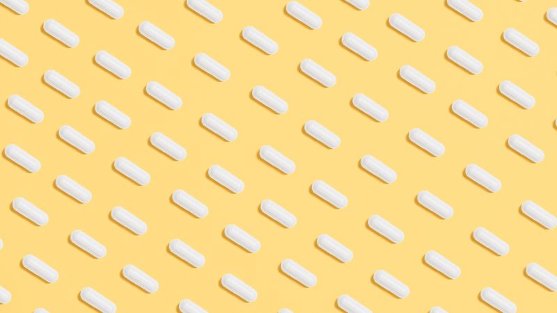 Pills and medication bottles illustrating CBD drug interactions risk