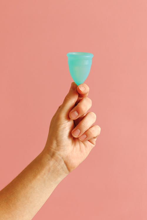 Free Person Holding Menstrual Cup Stock Photo