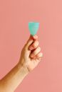 Person Holding Menstrual Cup