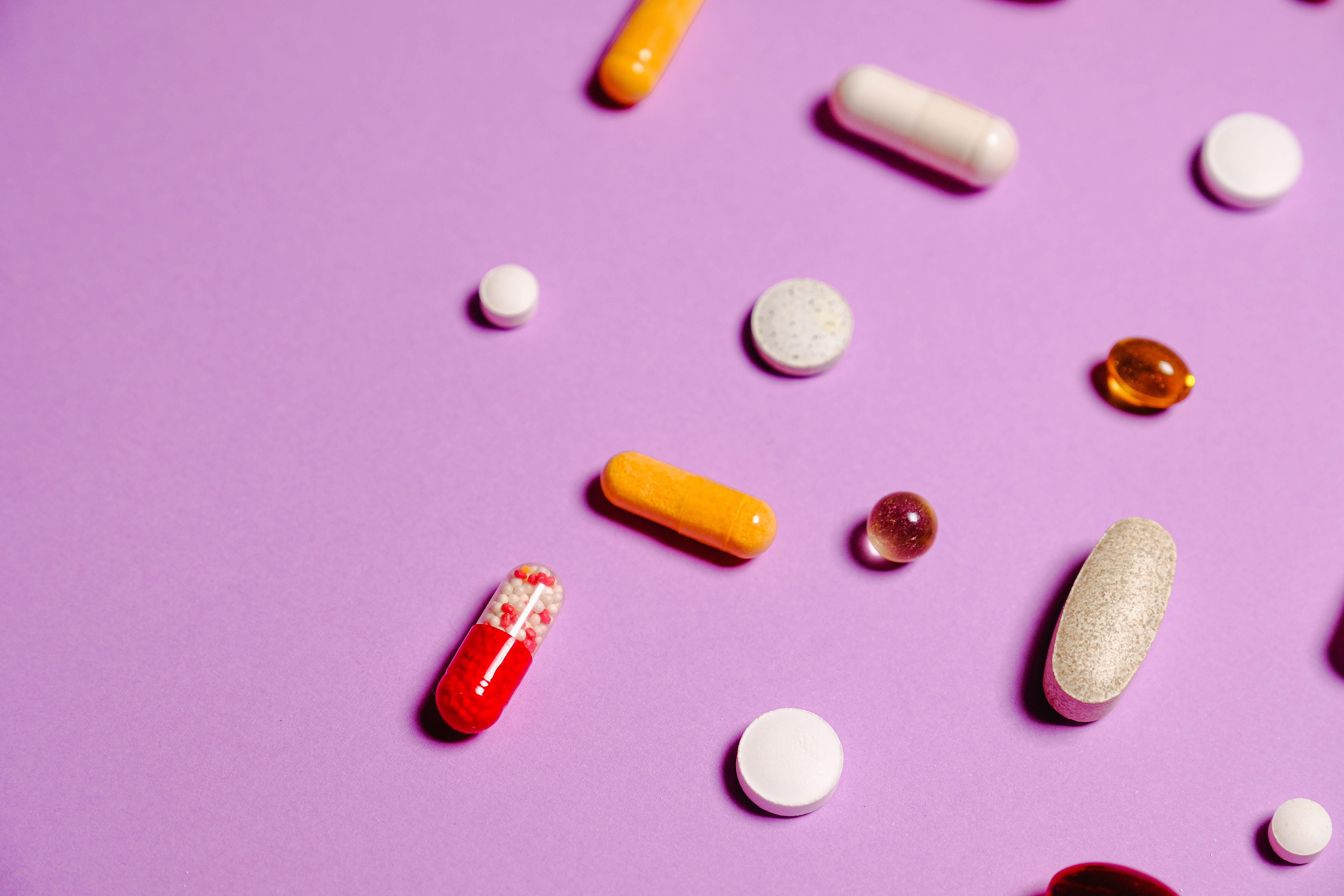 Red and White Medication Pills · Free Stock Photo