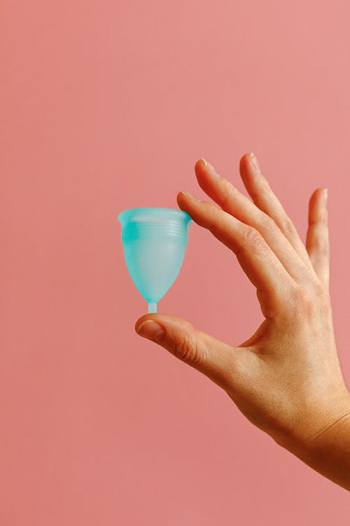 Free Person Holding A Blue Empty Silicon Stock Photo