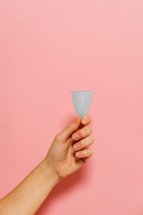 Free Person Holding Menstrual Cup Stock Photo
