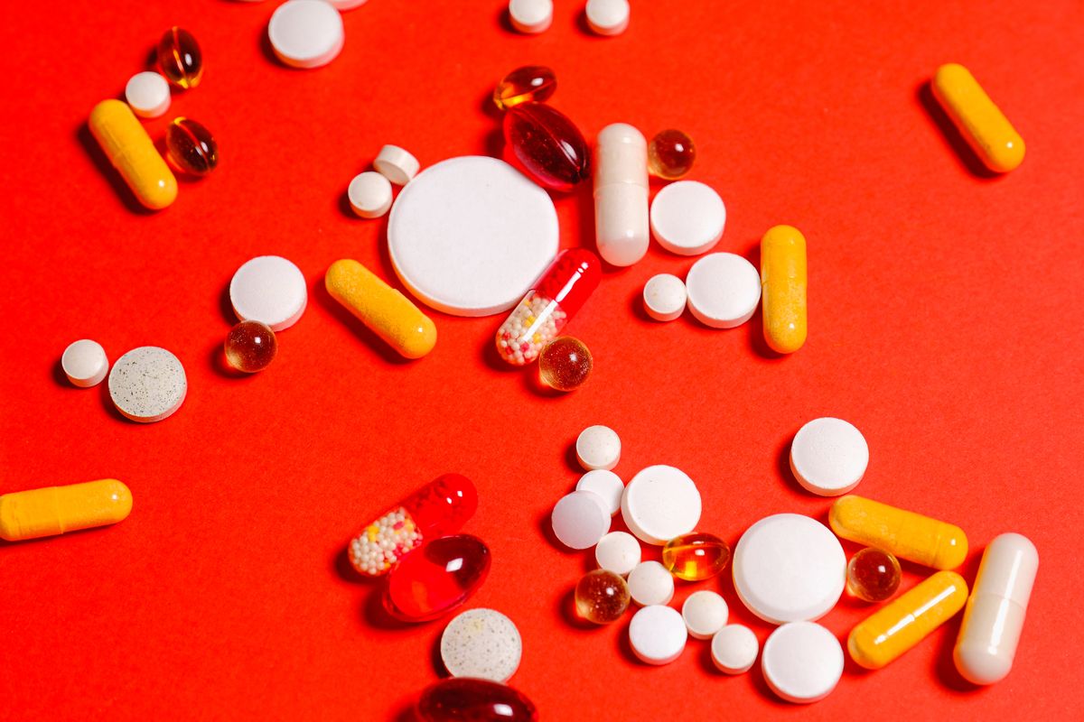 Doctor consulting with a patient about health and medication adherence