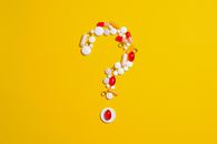 Medication Pills Isolated on Yellow background