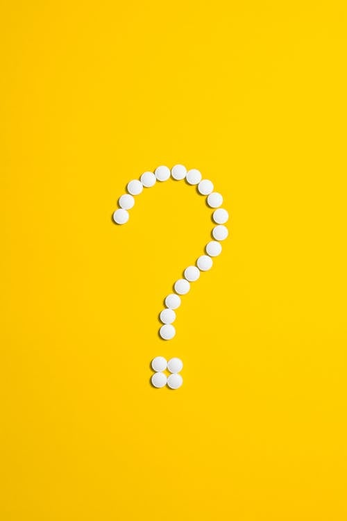 Free Question Mark on Yellow Background Stock Photo