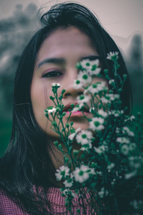 Woman Covered White and Green Flower