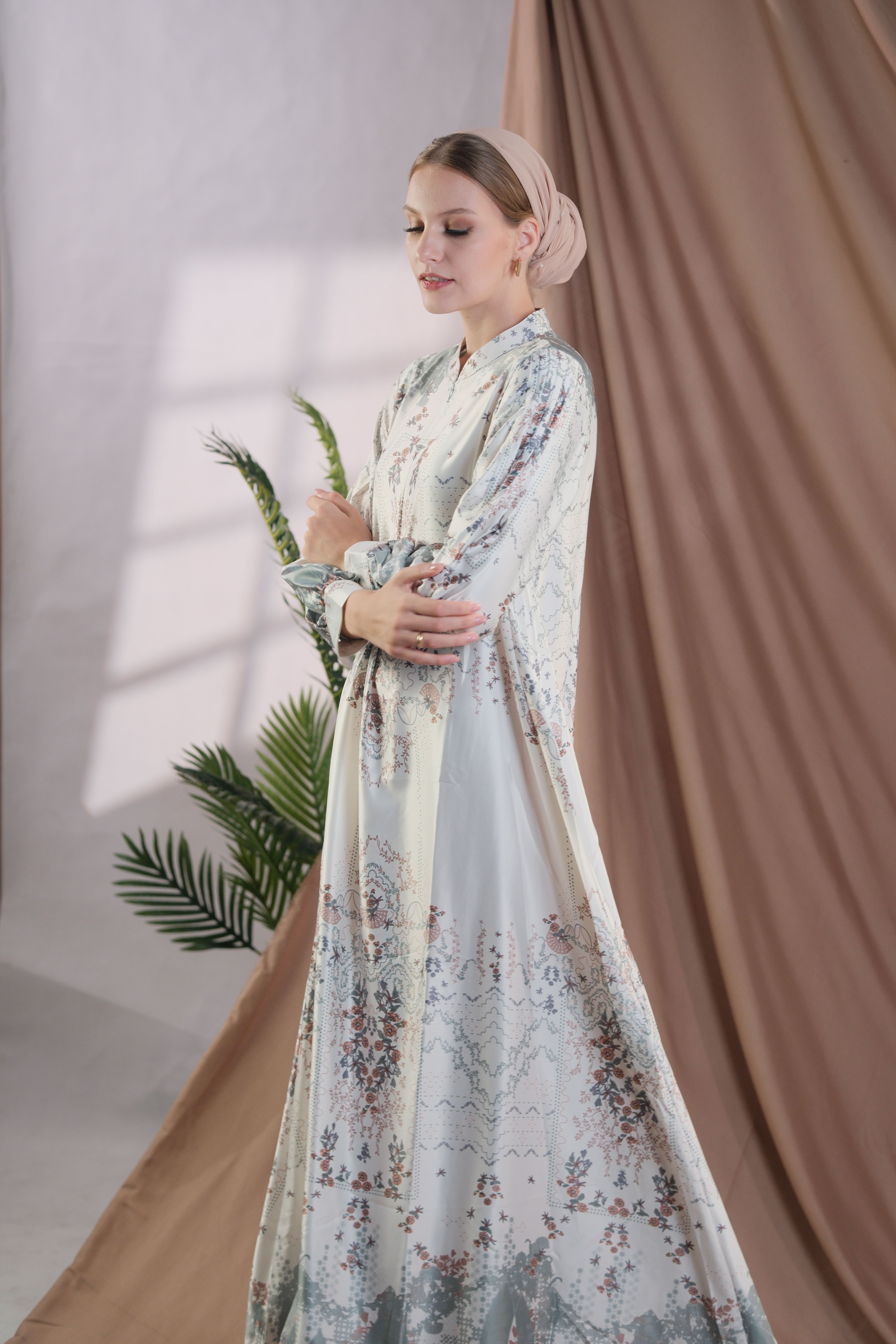 Elegant Woman in Traditional Dress Indoors · Free Stock Photo