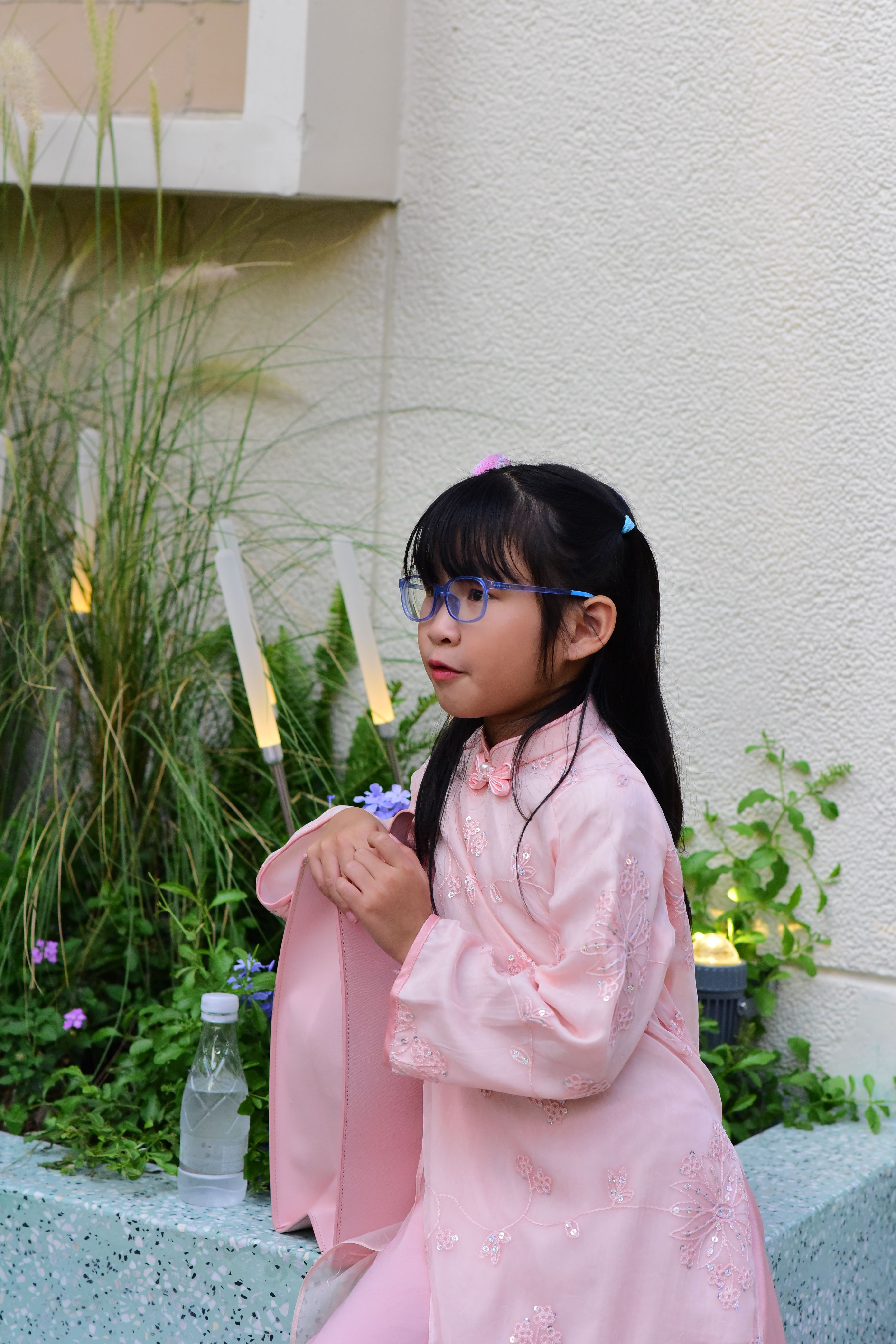 Young Girl in Traditional Pink Dress Outdoors · Free Stock Photo