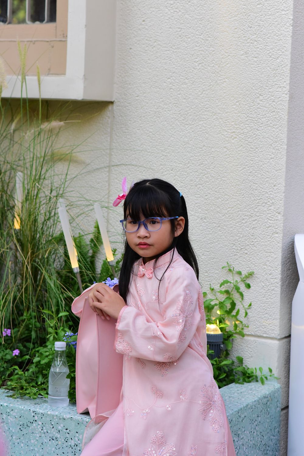 Young Girl in Traditional Pink Dress Outdoors · Free Stock Photo