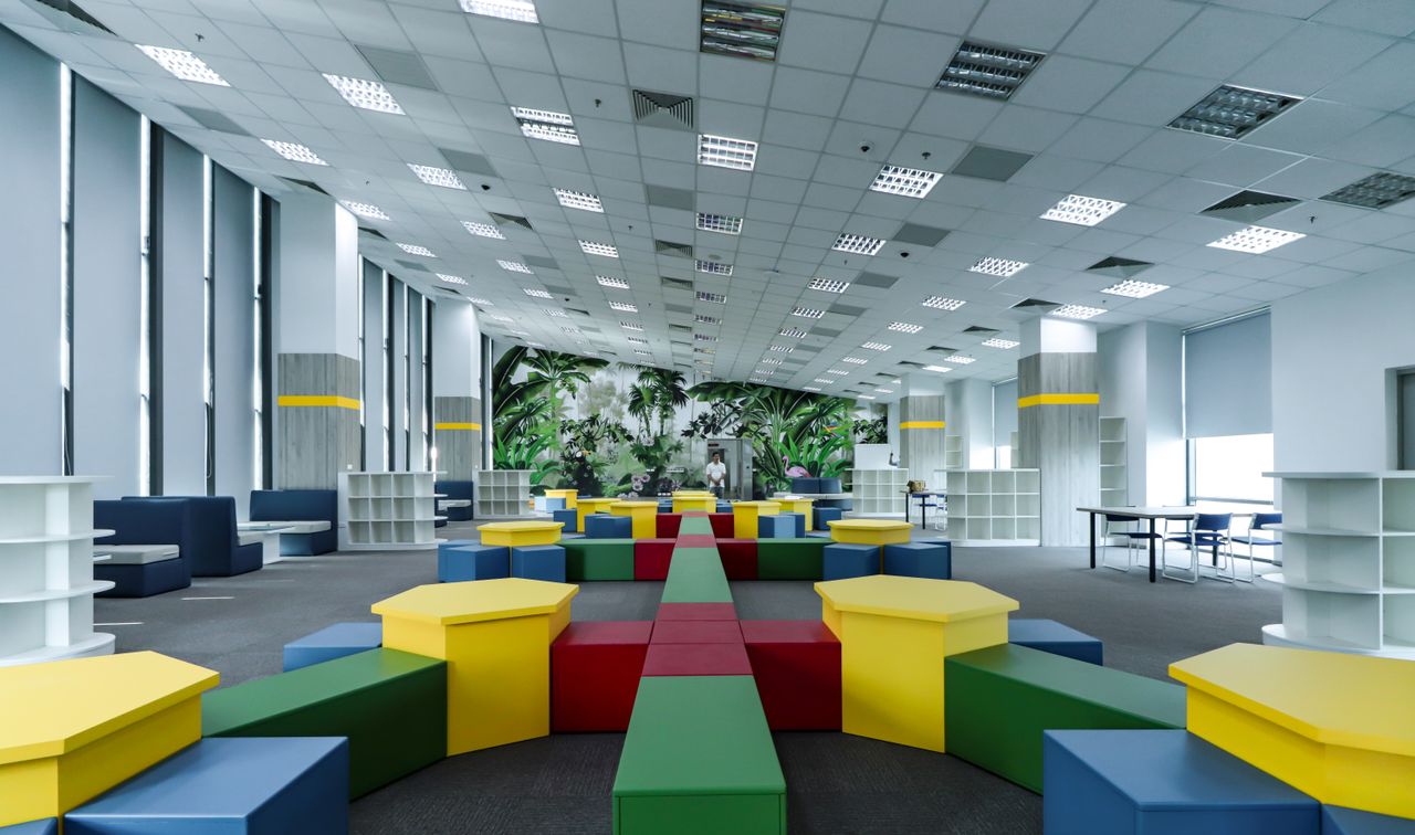 Spacious modern educational area with vibrant furniture