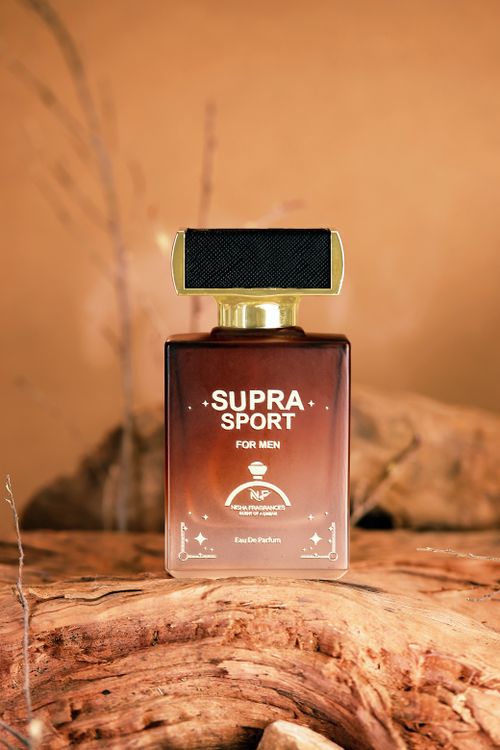 Free Luxury men's perfume displayed in a natural, earthy setting with a wooden backdrop. Stock Photo