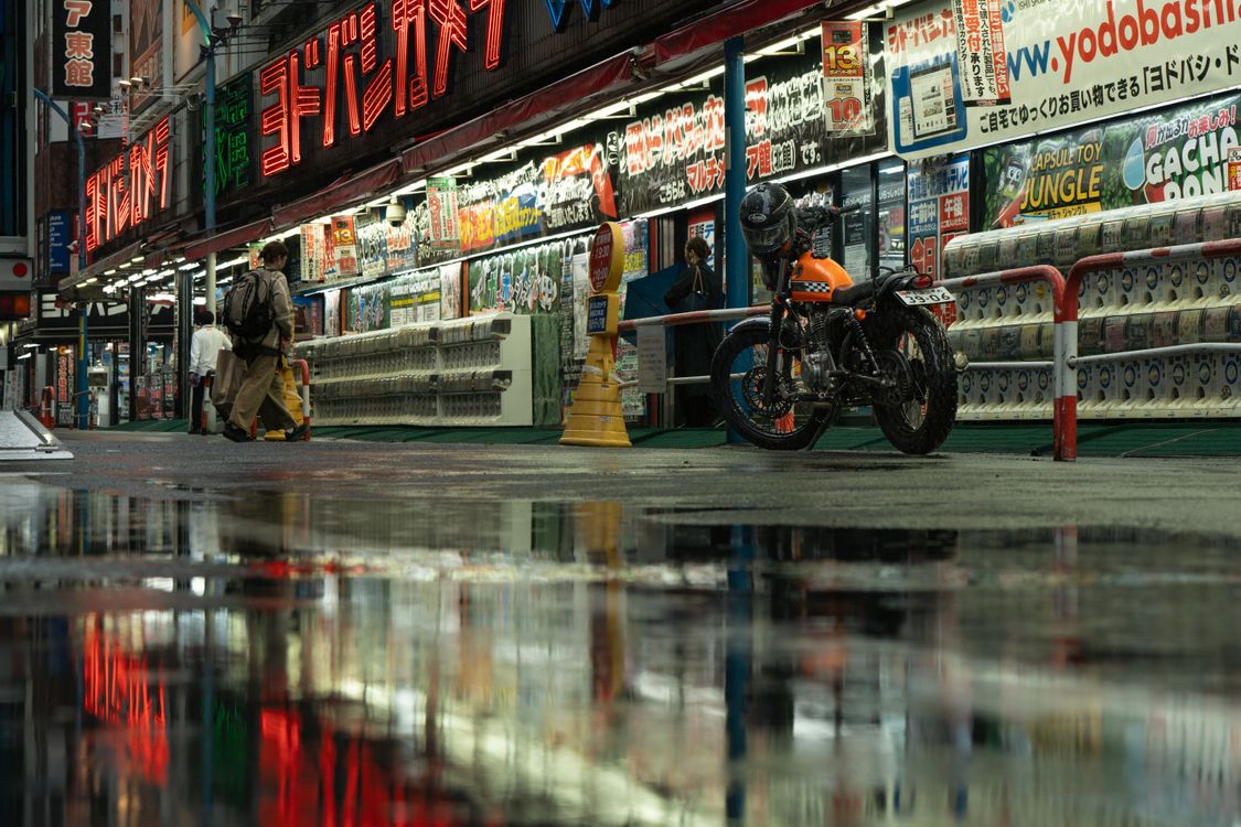 Vibrant Tokyo Night Street Scene With Reflections · Free Stock Photo