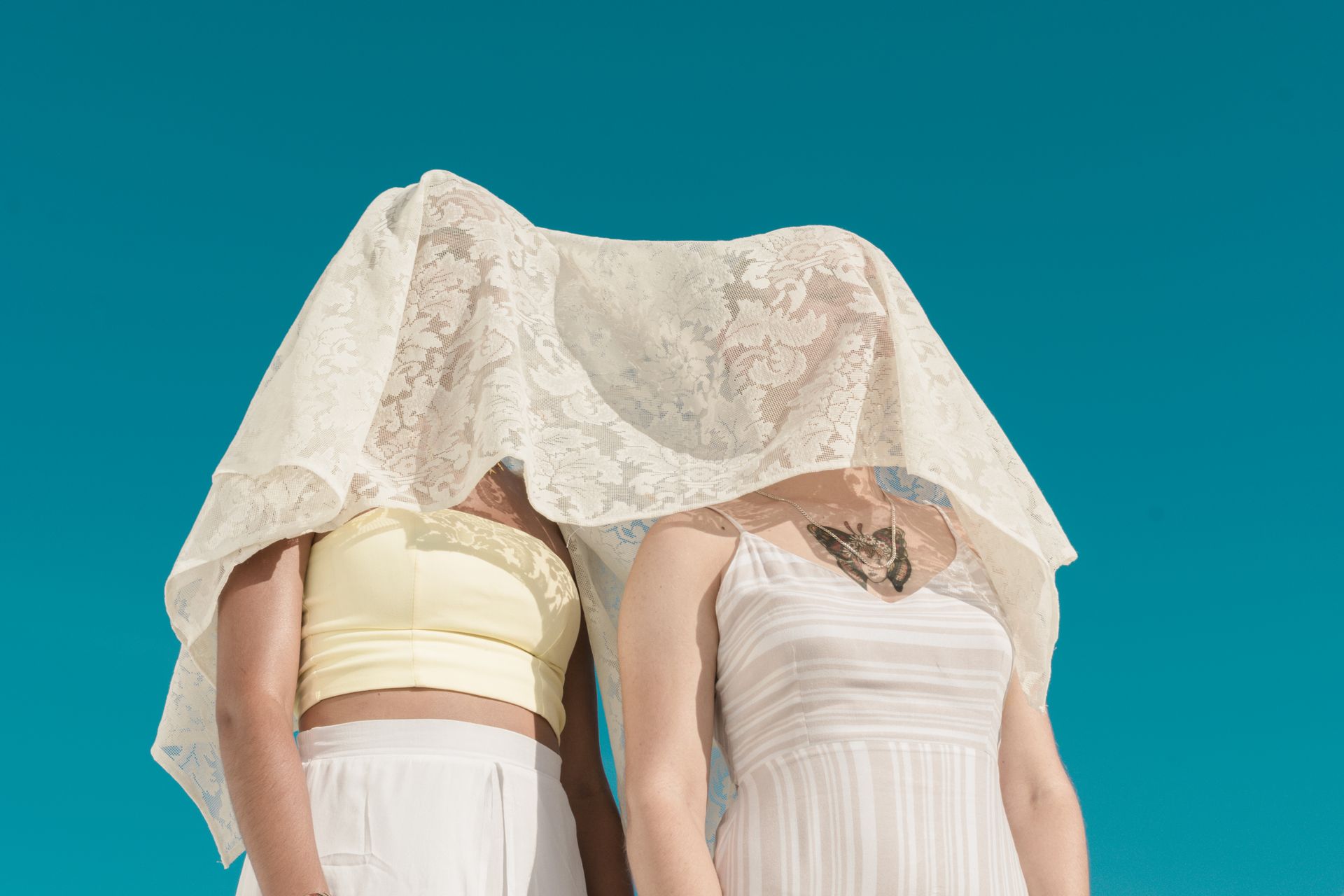 Photo of a Woman Covered Their Face In White Veil
