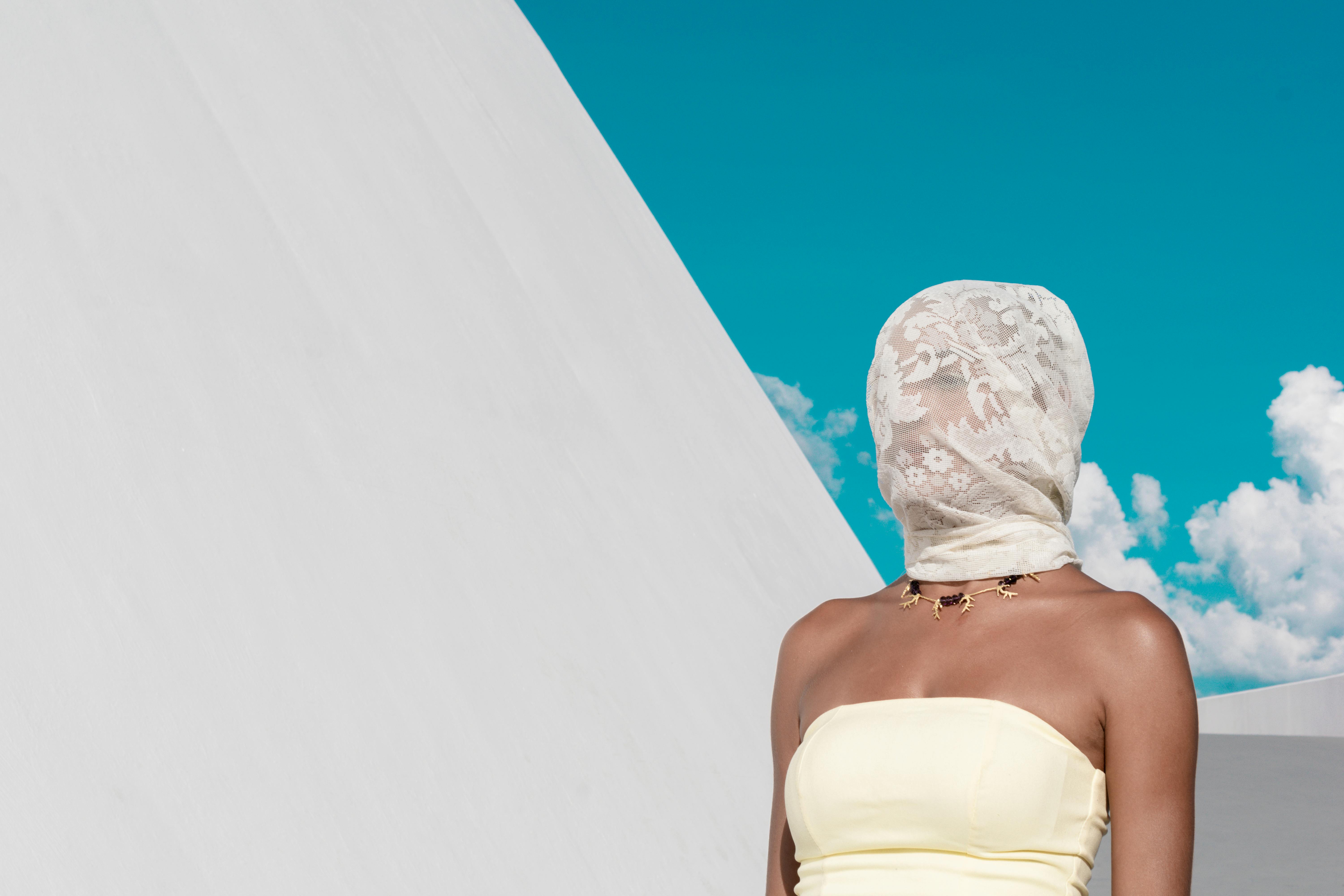 Woman in White Tube Top Covering Her Face With Veil · Free Stock Photo