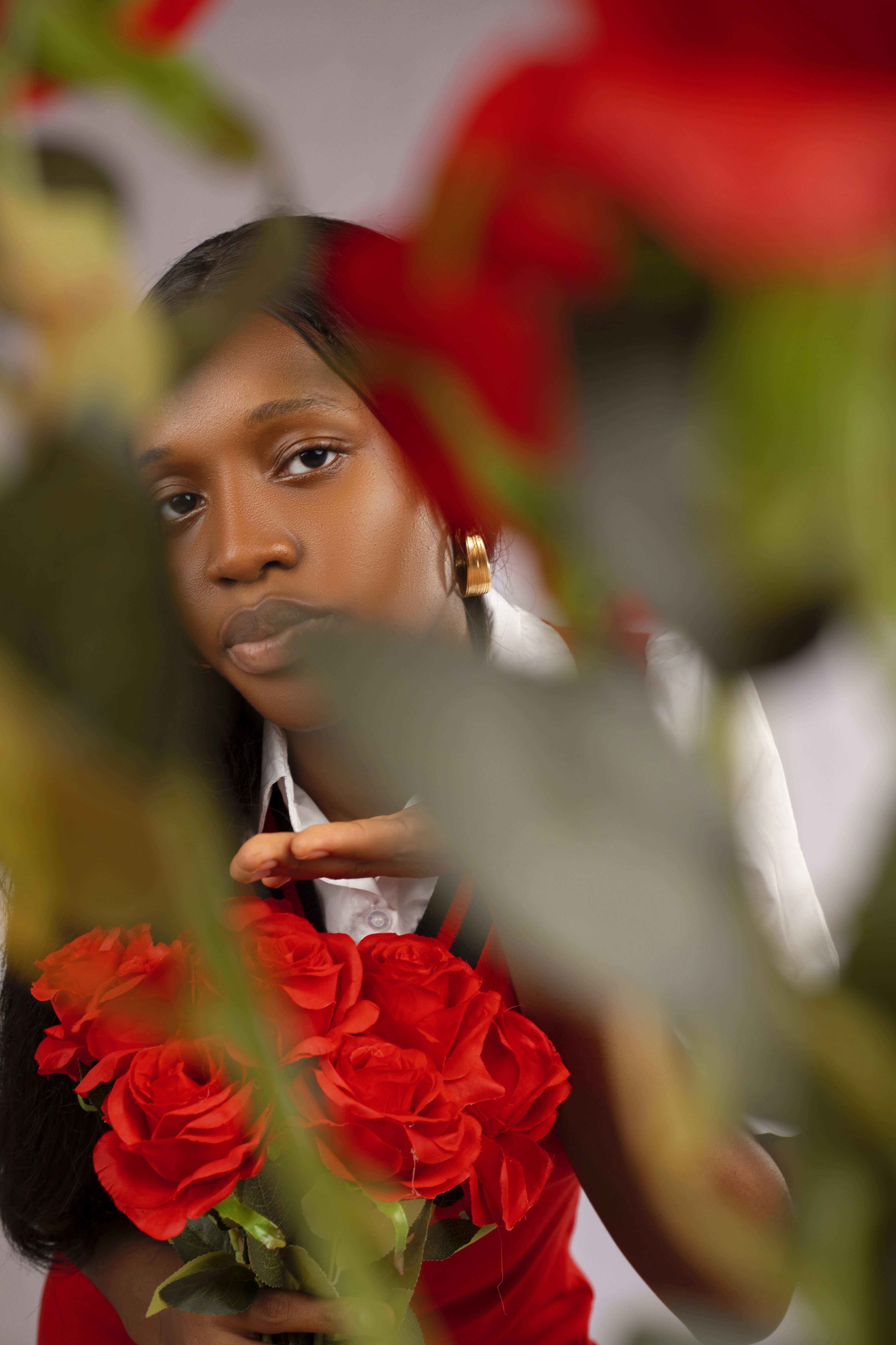 Portrait of a Woman with Red Roses · Free Stock Photo