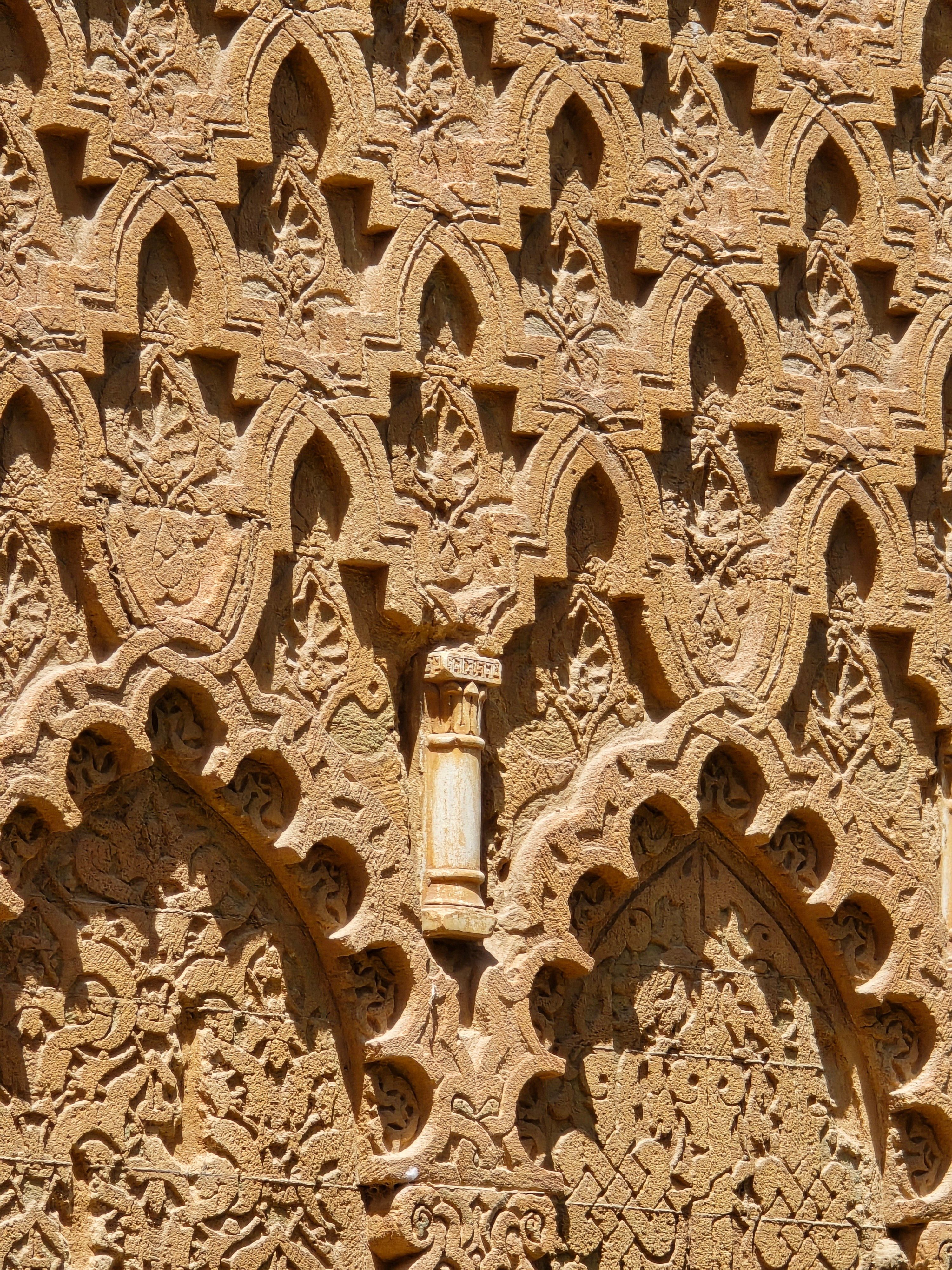 Intricate Islamic Architectural Stone Carving · Free Stock Photo