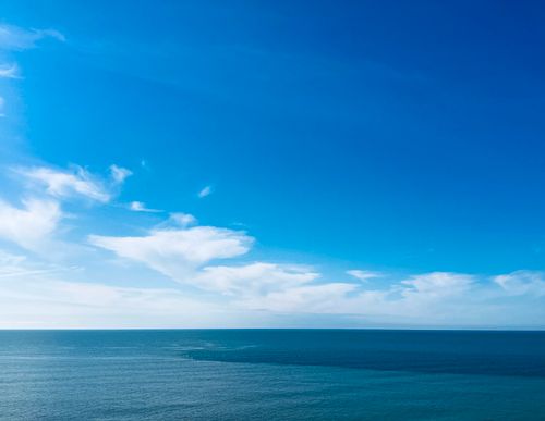 Free Tranquil view of the sea and sky, perfect for relaxation and nature lovers. Stock Photo