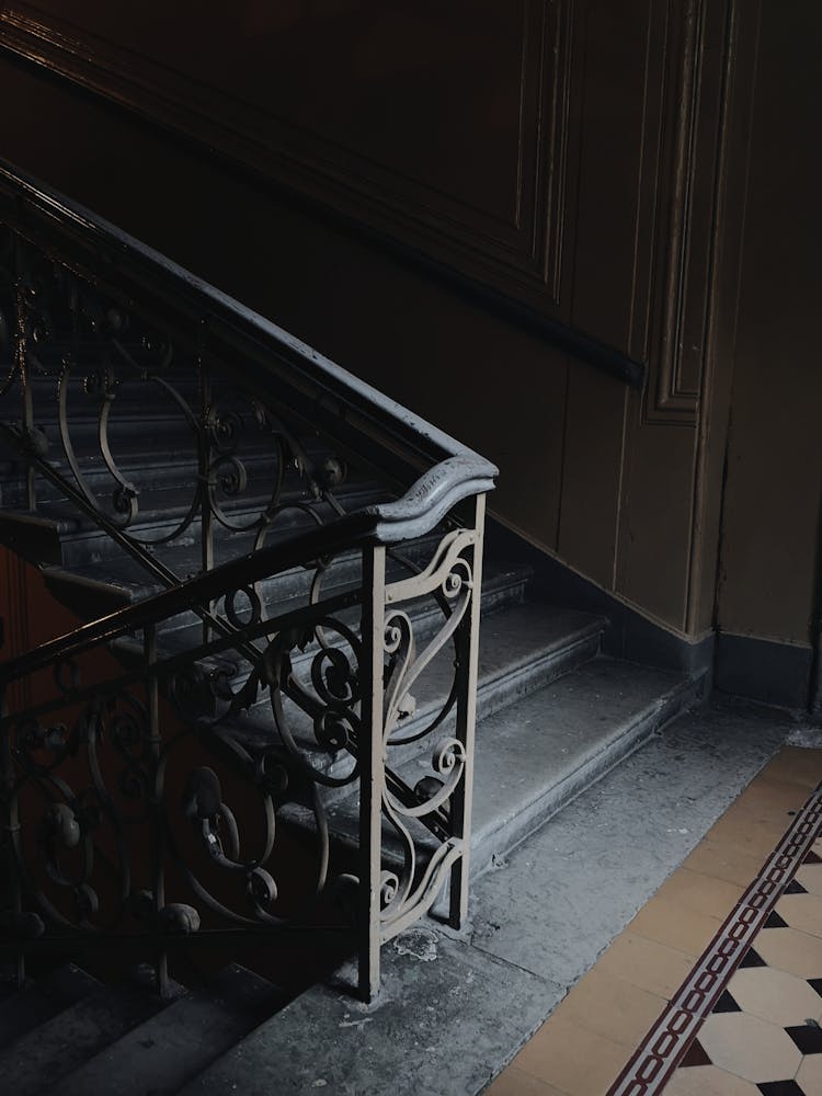 Staircase With Black Metal Handrail