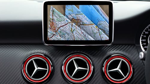 Free GPS Device Attached On Dash Board Stock Photo