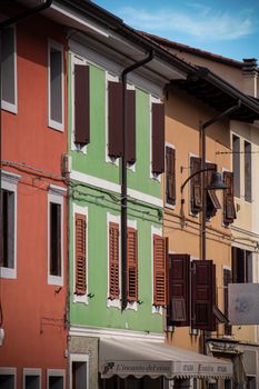 Vibrant Italian architecture in Palmanova with colorful building facades.