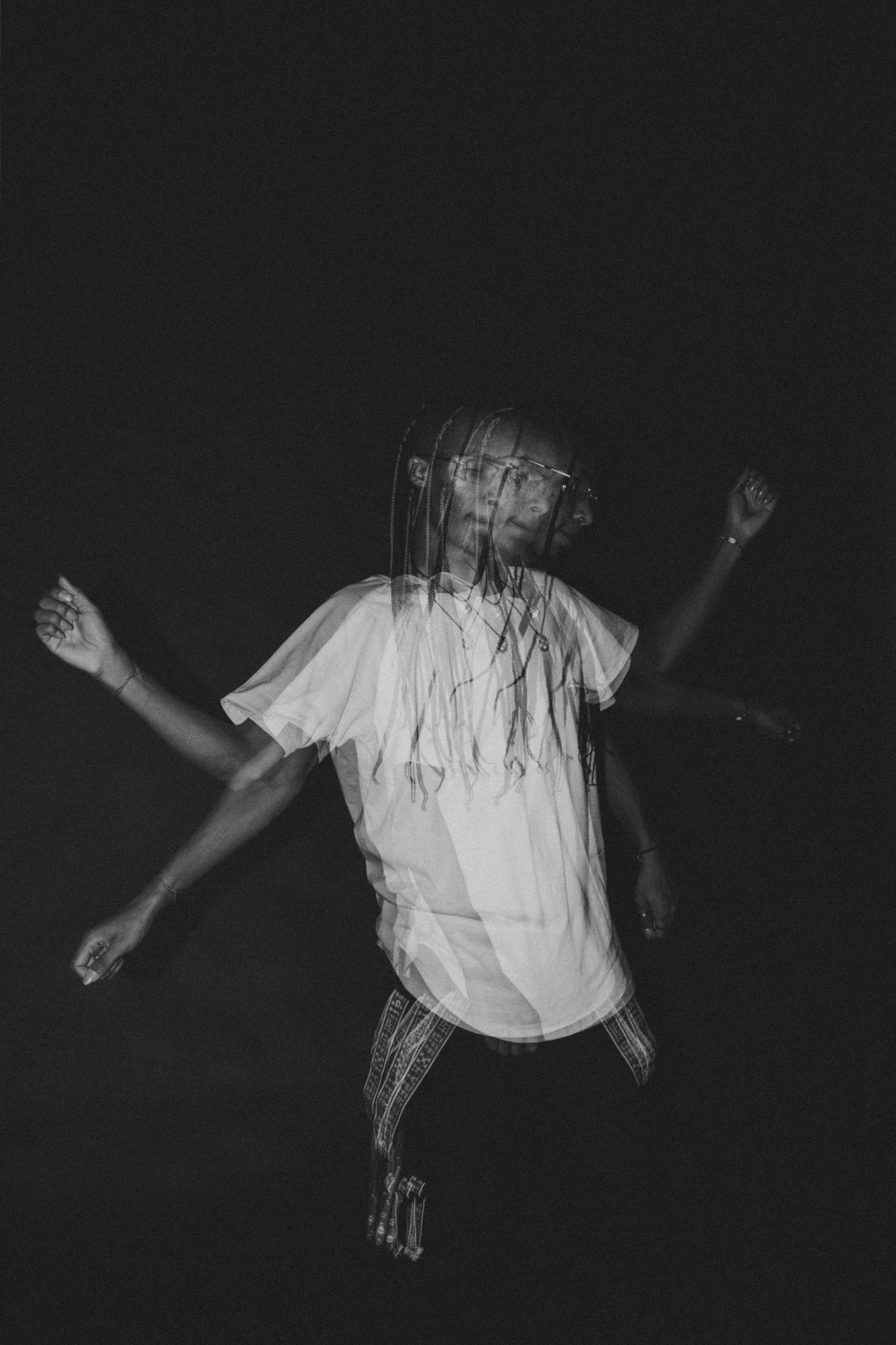 Dynamic Motion Blur Portrait in Black and White · Free Stock Photo