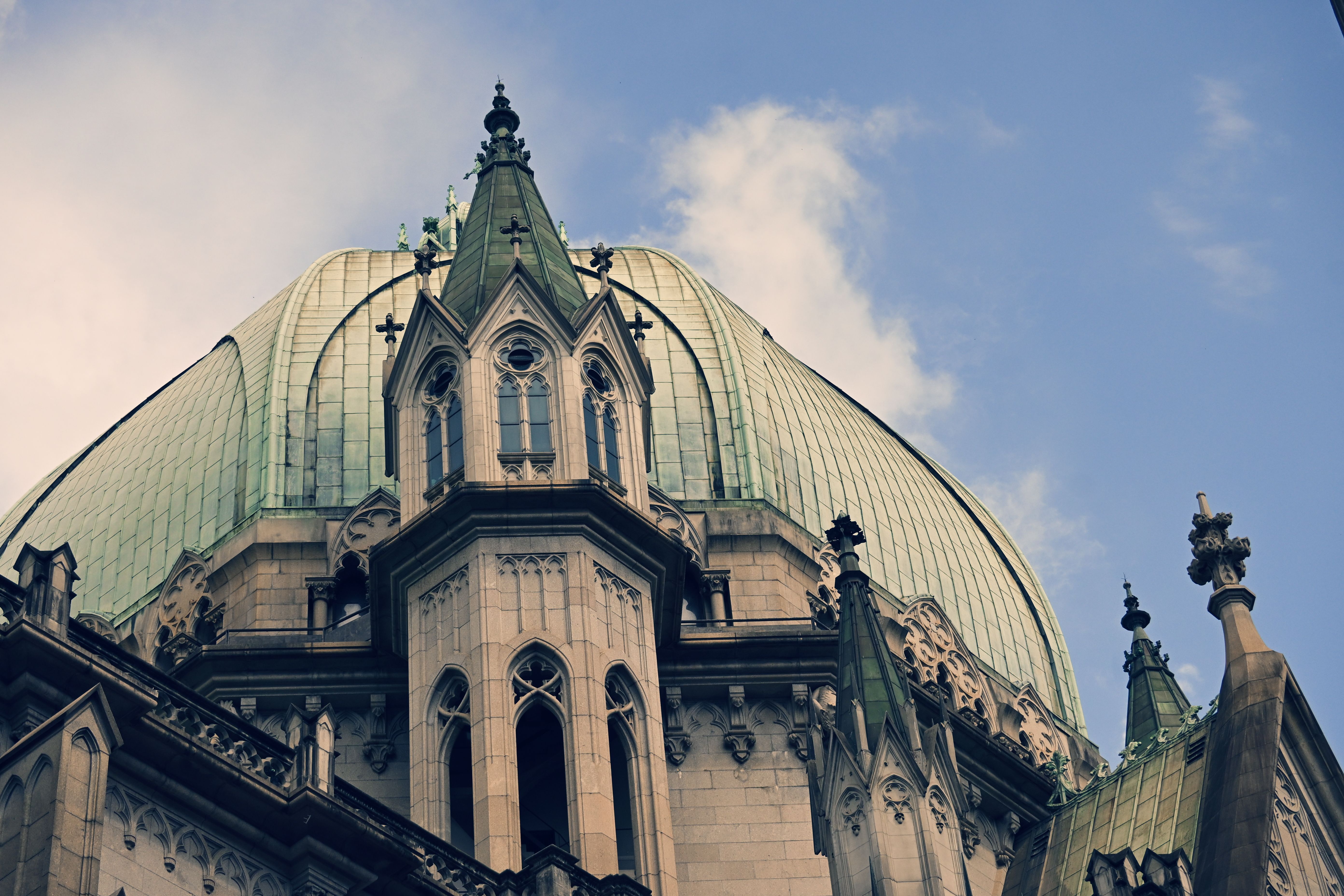 Gothic Cathedral Roof Against Blue Sky · Free Stock Photo