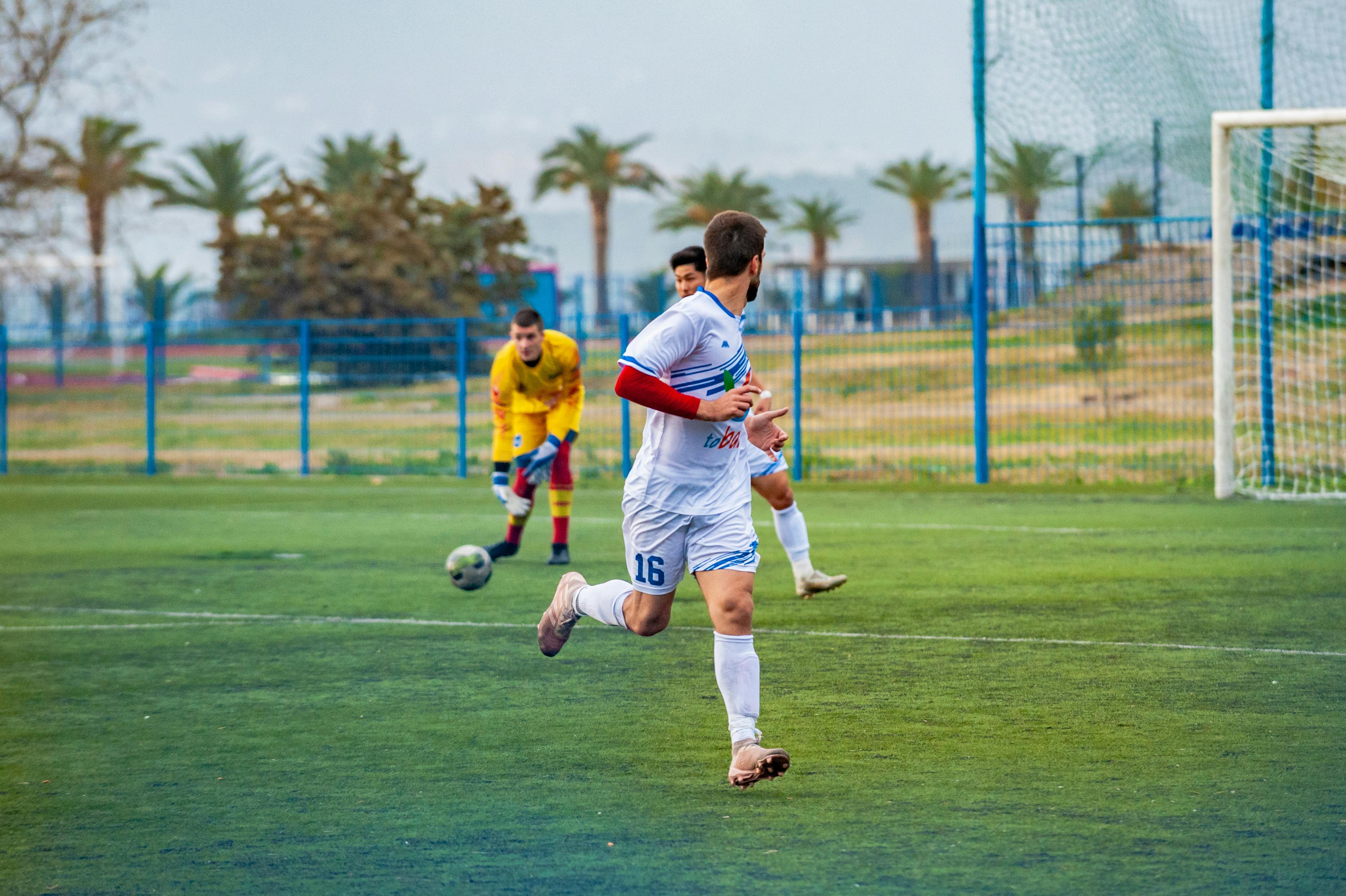 Photo Of People Playing Soccer During Daytime · Free Stock Photo