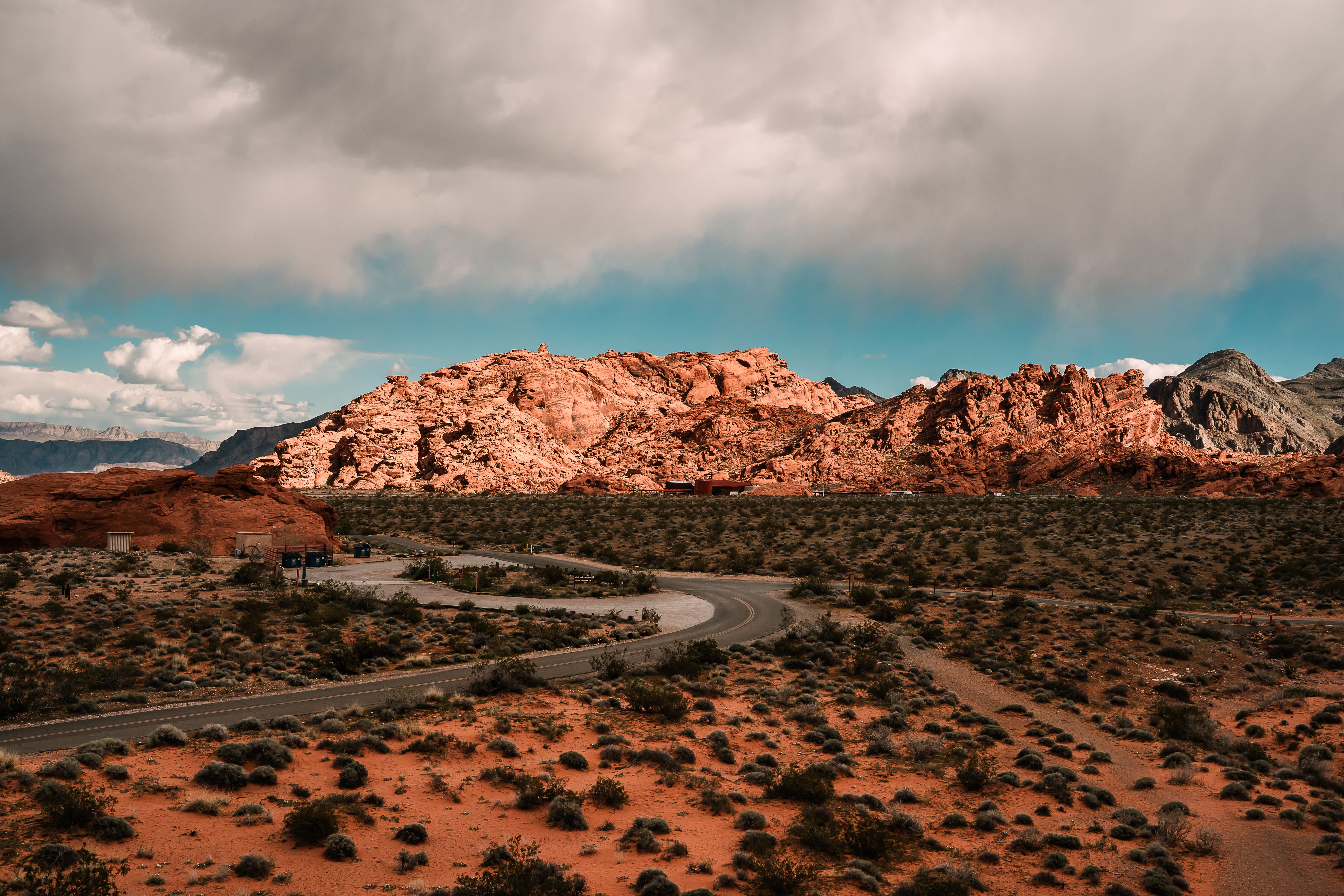 Capture the stunning red rock formations and winding roads of Moapa Valley, Nevada.