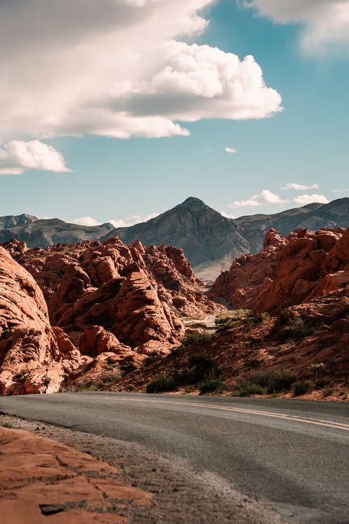 Free Explore the stunning red rock formations and winding road of Moapa Valley, Nevada. Stock Photo