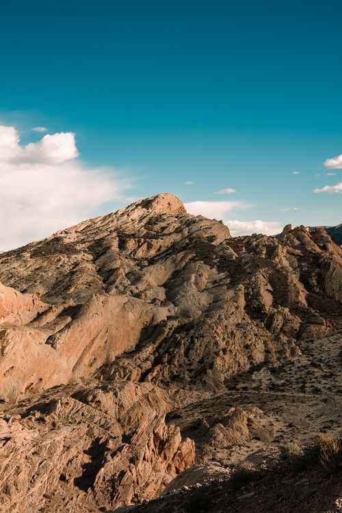 Free Explore the dramatic landscapes of Moapa Valley with rugged rock formations under a clear blue sky. Stock Photo