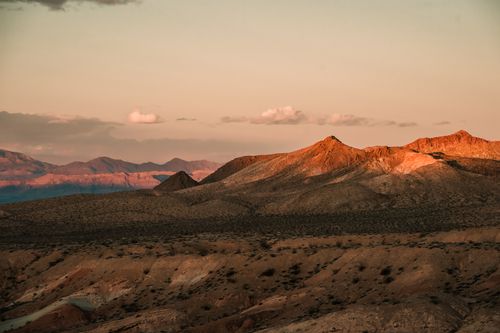 Free Stunning sunset view over the rugged terrain of Moapa Valley, Nevada. Stock Photo