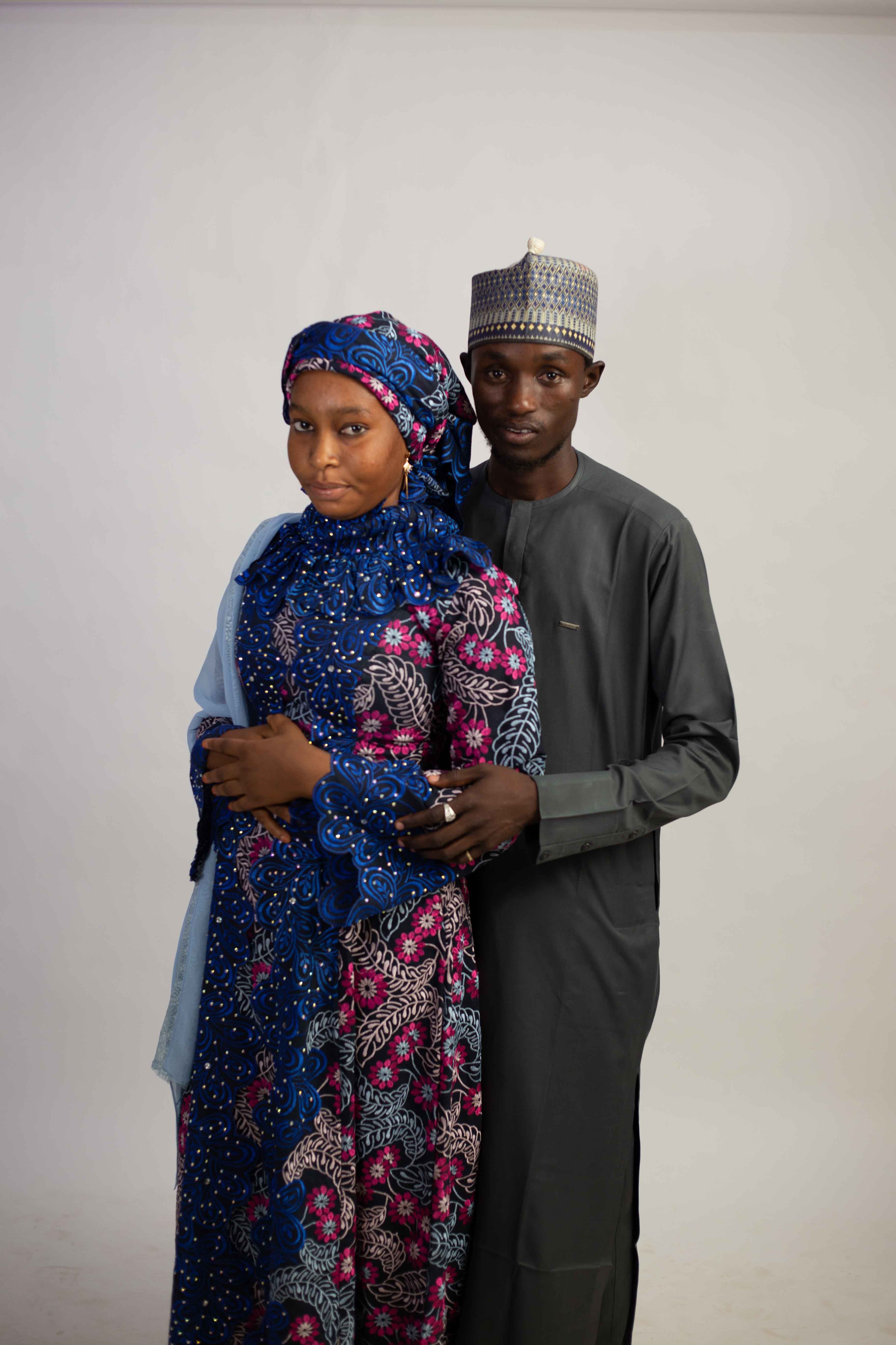 Traditional Portrait of Couple in Cultural Attire · Free Stock Photo