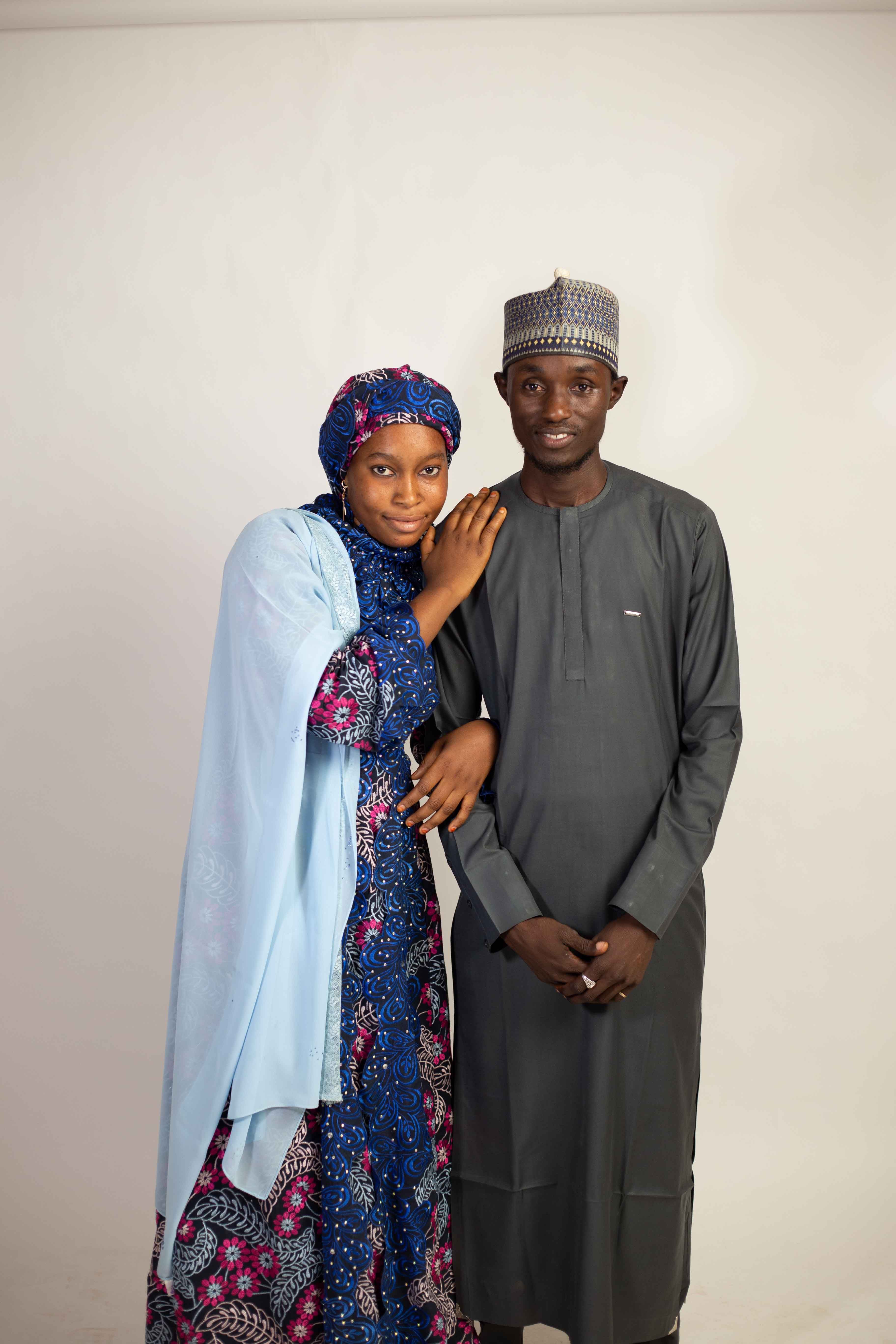 Portrait of a Couple in Traditional Attire · Free Stock Photo