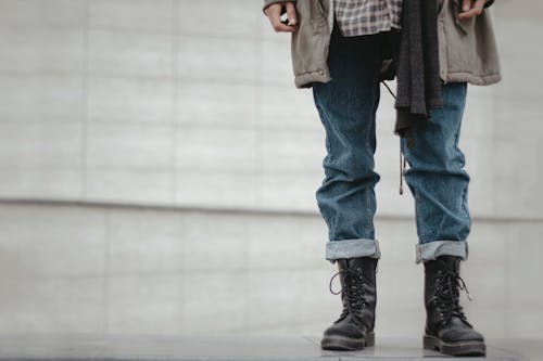 Photo Of Person Wearing Denim Pants