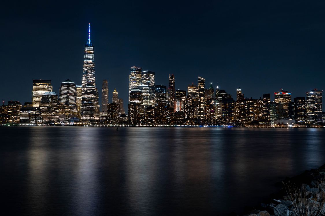 Dazzling New York City Night Skyline Reflection · Free Stock Photo