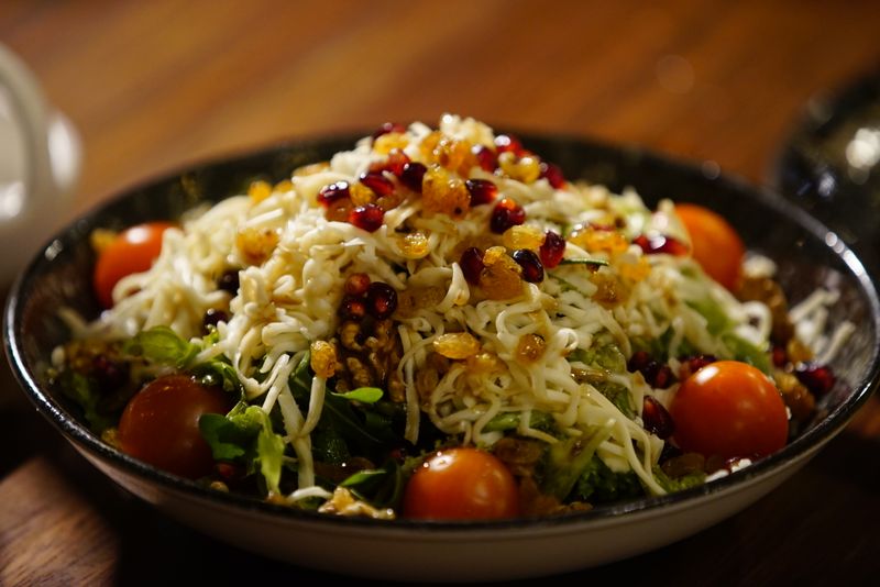 couscous salad with curry-spiced chickpeas and raisins