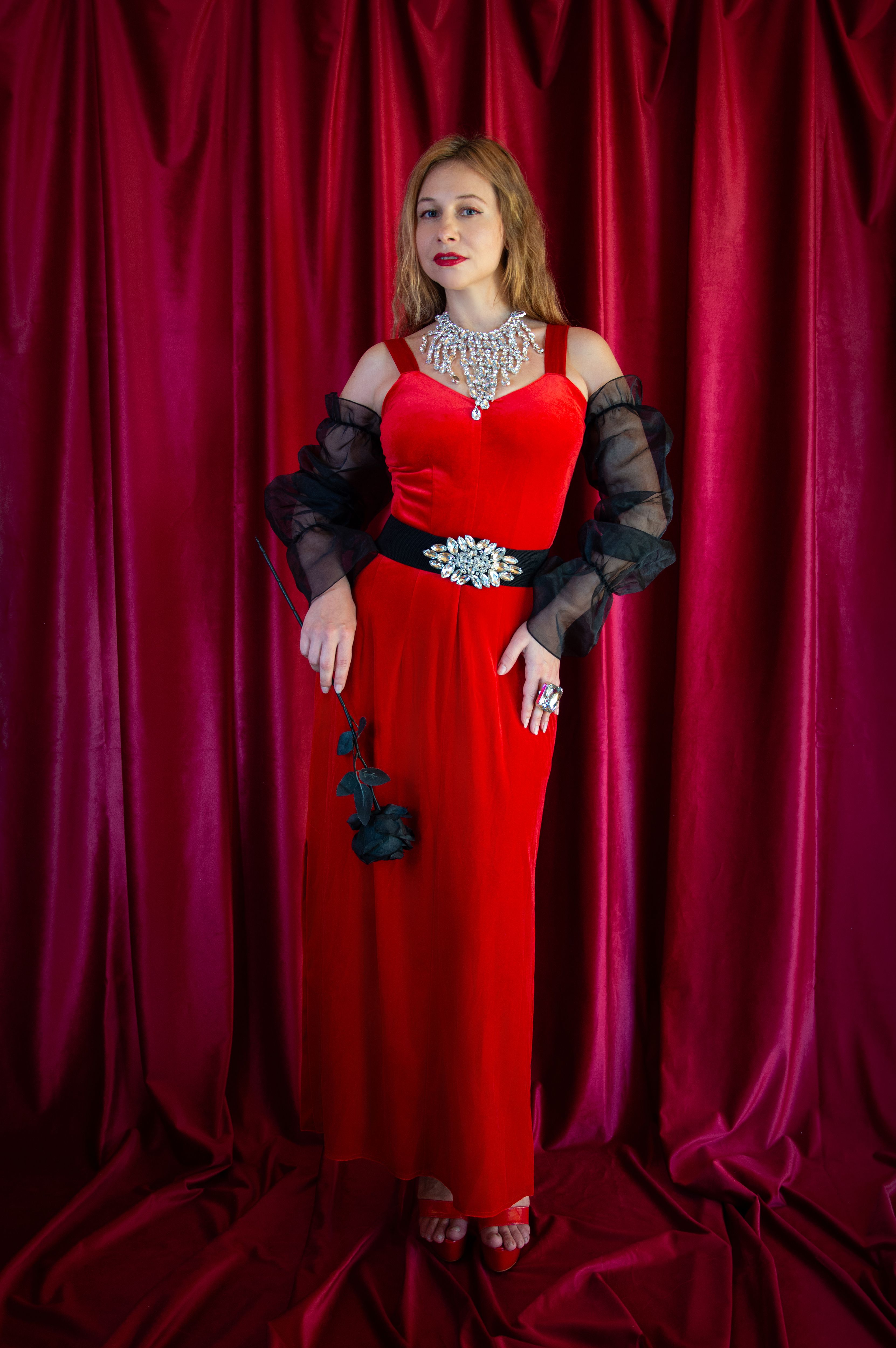 Elegant Woman in Red Gown with Rose · Free Stock Photo