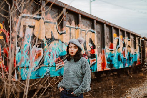 Photo Of Woman Wearing Grey Sweater