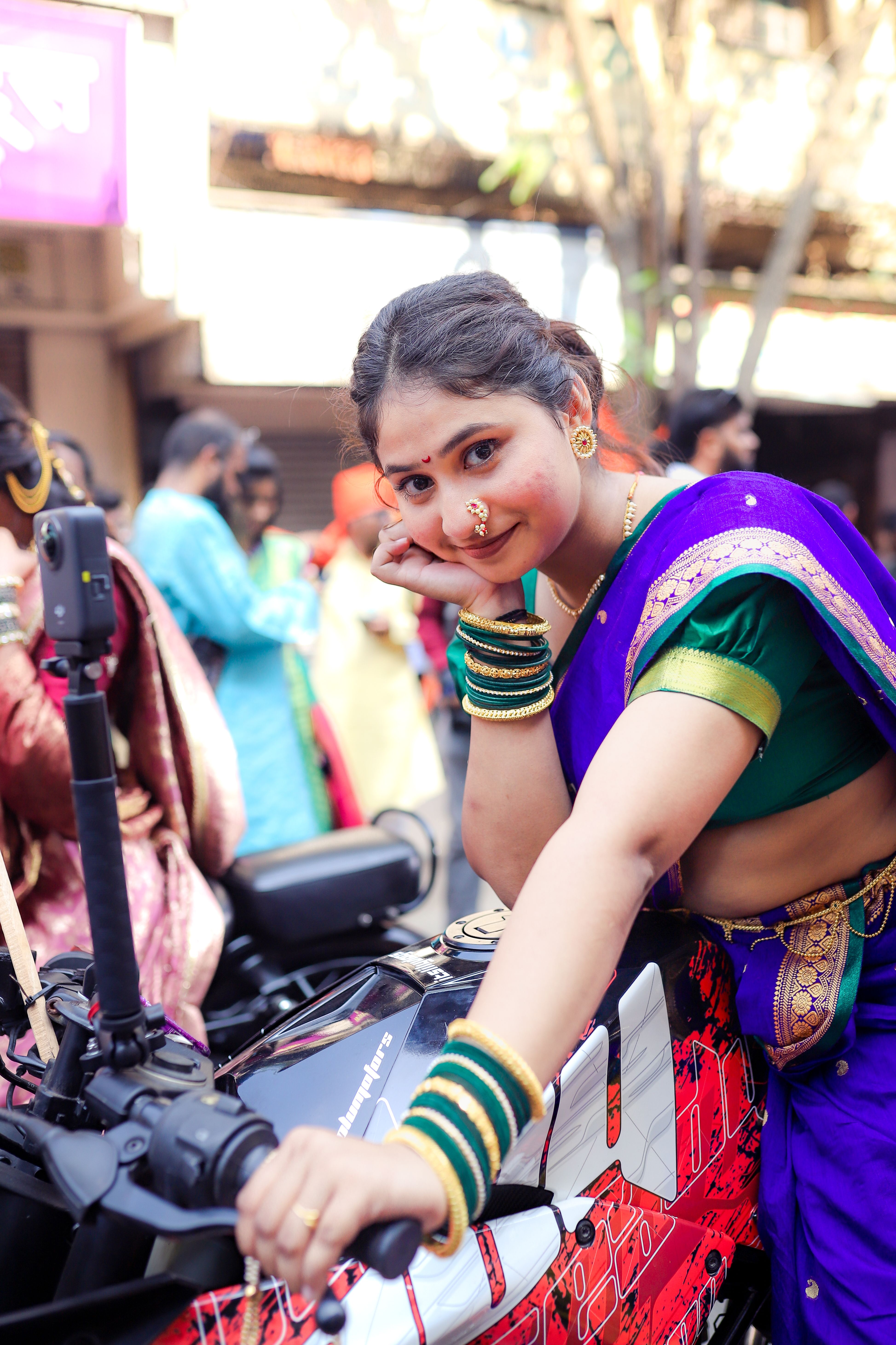 Indian Woman in Traditional Attire Beside Motorcycle · Free Stock Photo