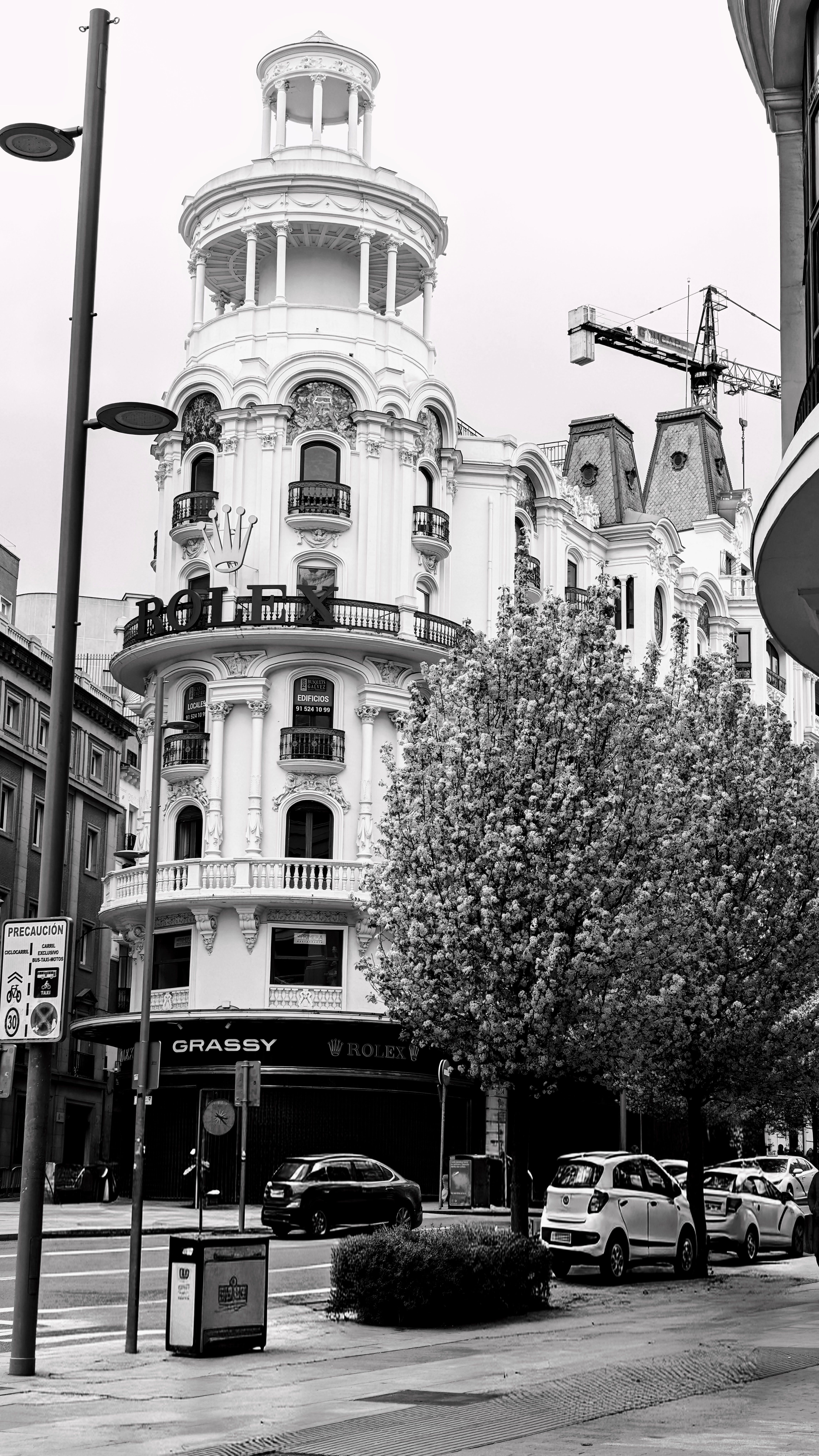Black and White Street Scene with Historic Building · Free Stock Photo