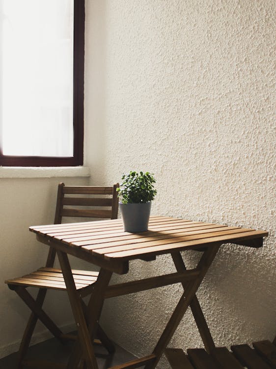 Brown Wooden Table and Chair