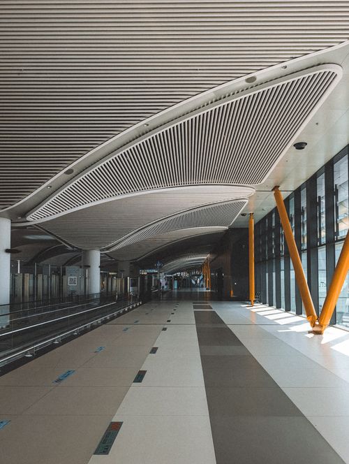 Free Explore the sleek and contemporary design of Istanbul Airport's interior featuring unique structural elements. Stock Photo
