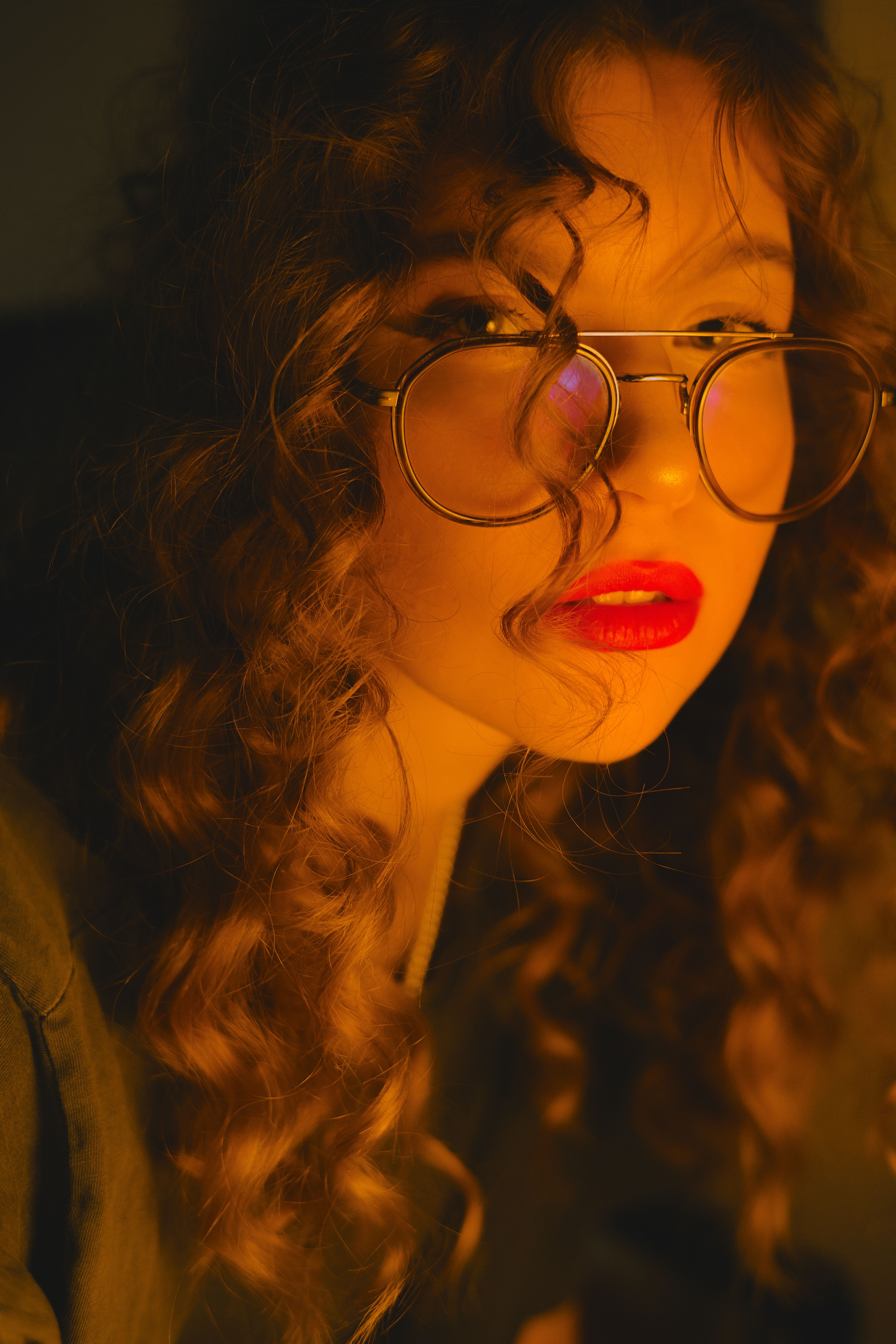 Artistic Portrait of a Woman with Curly Hair · Free Stock Photo