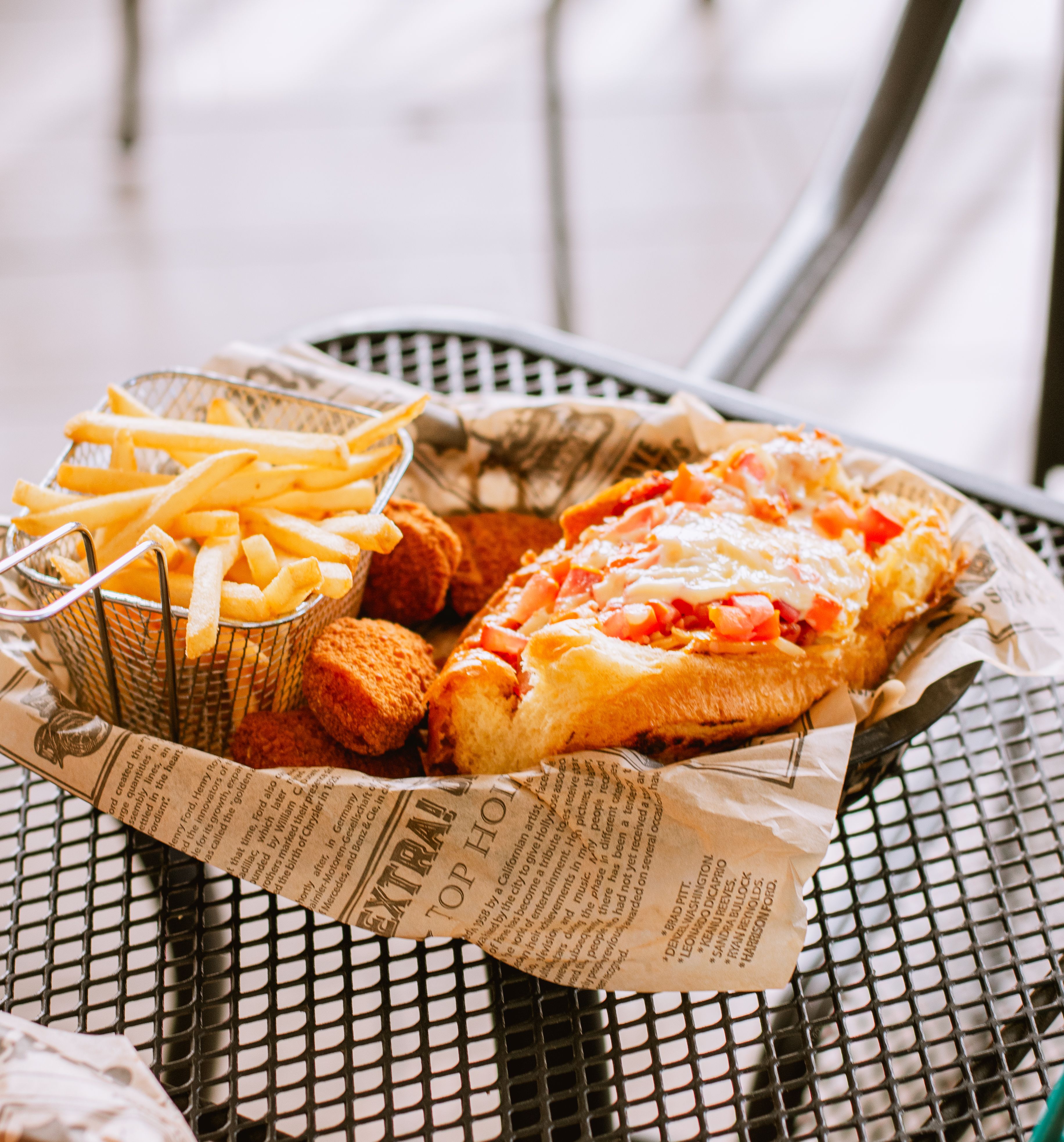 Delicious Fast Food Meal on Outdoor Table · Free Stock Photo