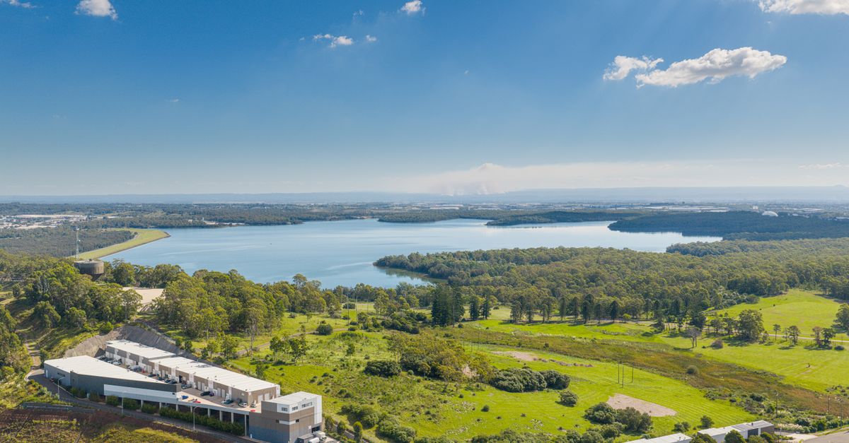 Scenic aerial view of Prospect Reservoir surrounded by lush greenery in New South Wales, Australia.