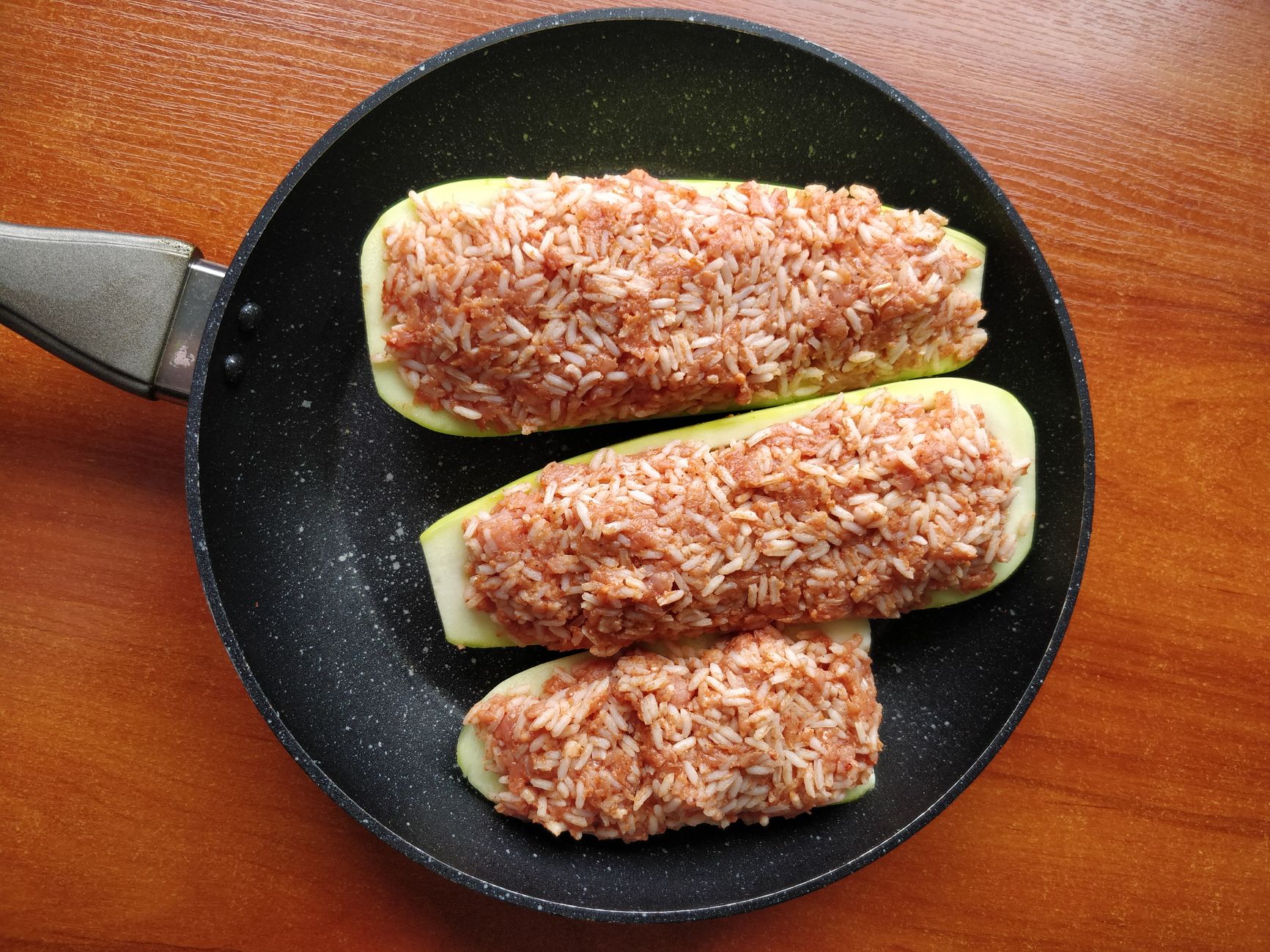 Golden stuffed zucchini blossoms with marinara sauce