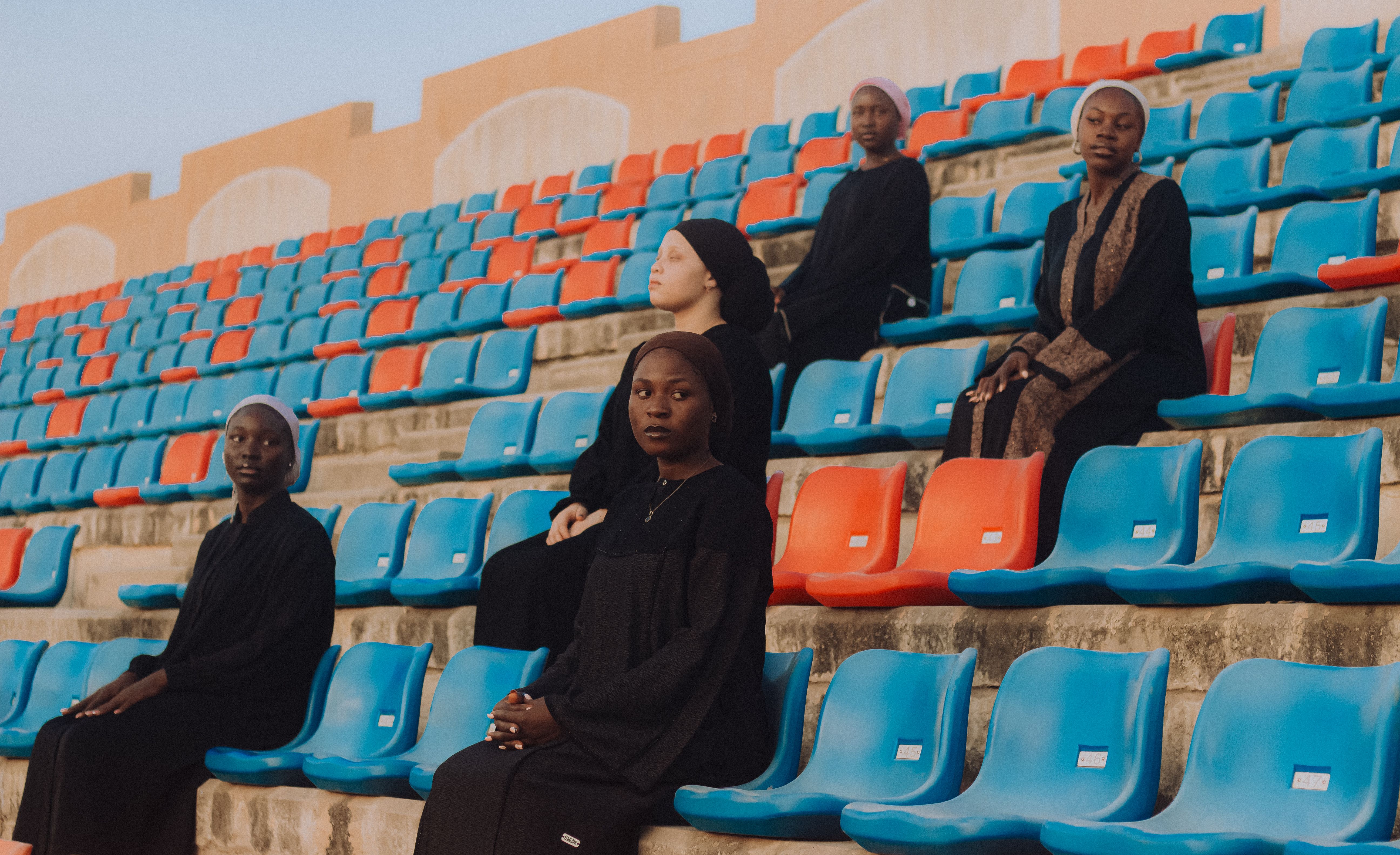 Group of Women in Stadium Seating in Nigeria · Free Stock Photo