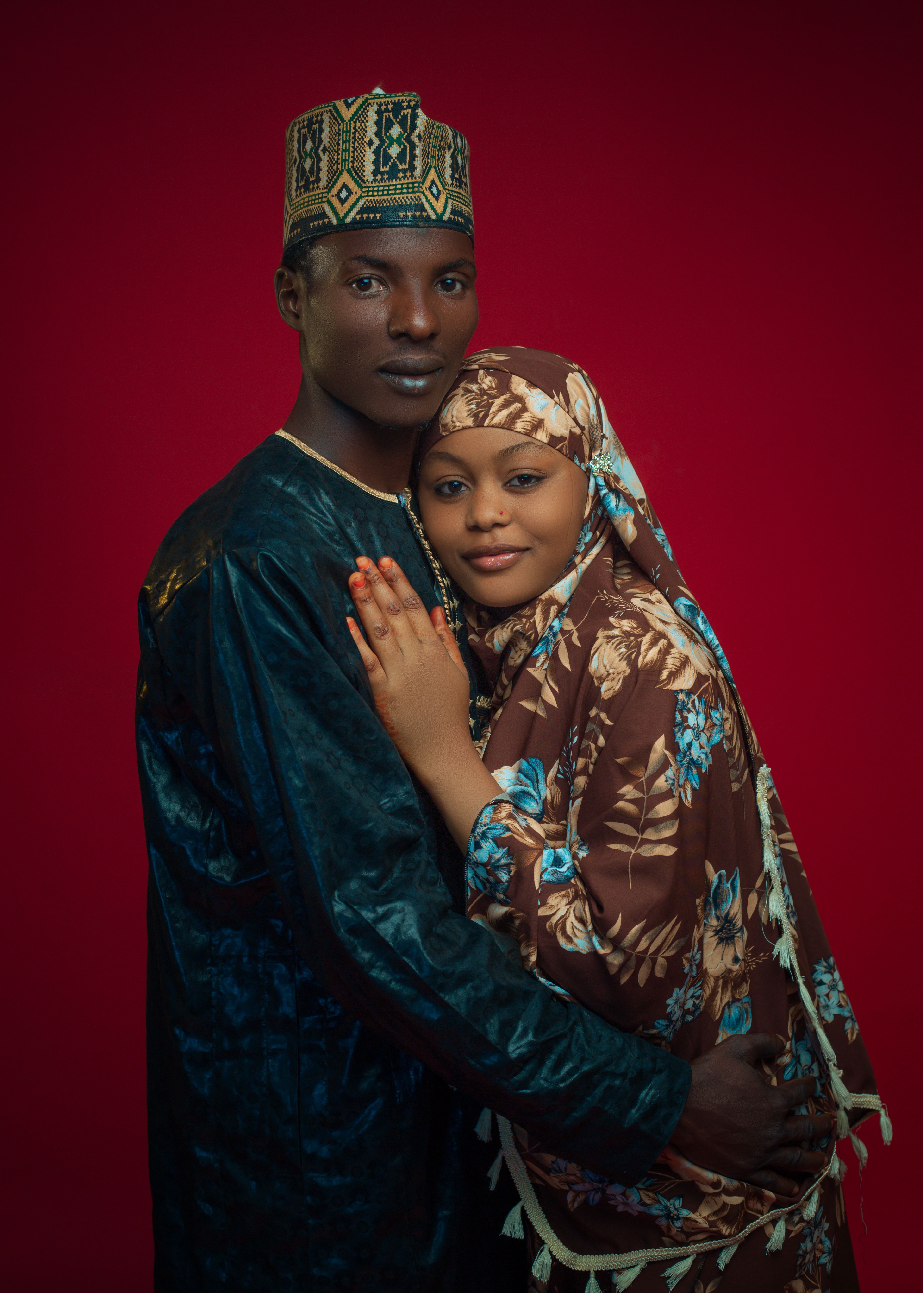 Portrait of a Loving Couple in Traditional Attire · Free Stock Photo